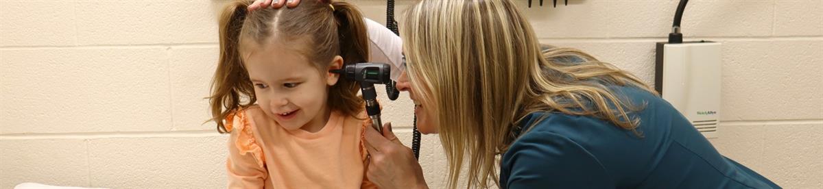 Healthcare worker with patient